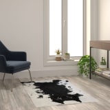 Barstow Collection 3' x 5' Black Faux Cowhide Print Olefin Area Rug with Jute Backing for Living Room, Bedroom, Entryway