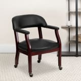 Black Vinyl Luxurious Conference Chair with Accent Nail Trim and Casters